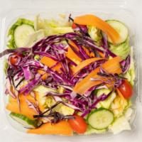Garden Salad · Mixed greens w/ shredded red cabbage, carrots, cucumbers, green peppers & cherry tomatoes.