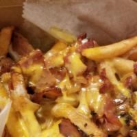 Crazy Fries · Mozzarella, cheese whiz, bacon.