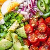Avocado Salad · Vegan. Spring mix, cherry tomato, shaved almonds, avocado.