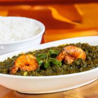 Shrimp Sagwala · Shrimp cooked with fresh spinach, spices and ginger. A specialty of the chef.