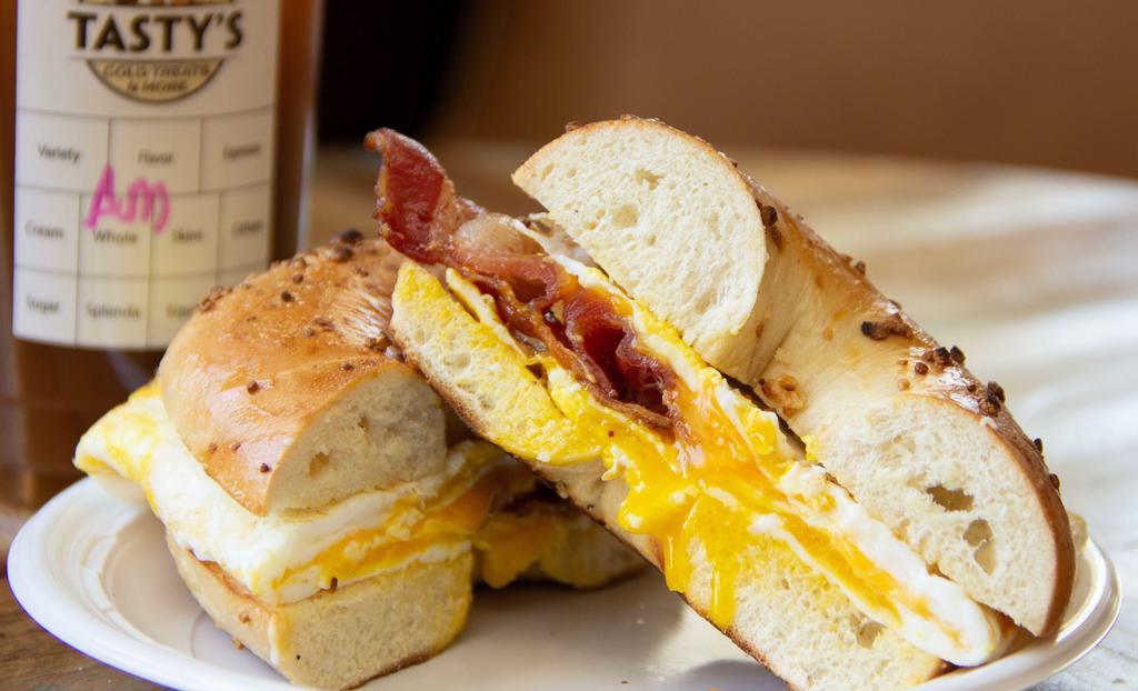 Bacon, Egg & Cheese · Freshly fried egg, bacon, American cheese.
 
*Consuming raw or undercooked meats, poultry, seafood, shellfish, or eggs may increase your risk of food borne illness.