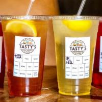 Iced Tea · Plain, Wildberry, or Green Iced Tea. Don't forget to add your favorite flavor!