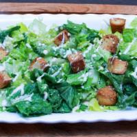 Chicken Caesar Salad · Romaine lettuce, grilled chicken*, caesar dressing, bagel croutons, Parmesan cheese.