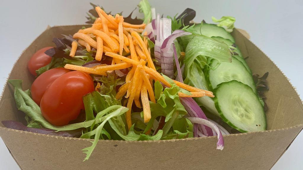 Garden Salad · Mixed Greens, carrots, grape tomatoes, red onions and cucumbers served with your choice of dressing