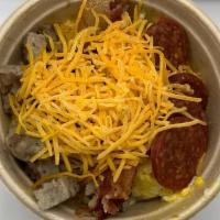 Meat Lovers Bowl · Scrambled eggs, sausage, bacon, pepperoni, cheddar cheese blend.