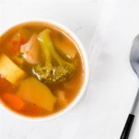 Minestrone Soup · Vegetables blended in a light tomato broth with ditalini pasta and cannelini beans.