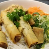Spring Rolls Vermicelli · Crispy spring rolls with finely ground pork, onion and mushrooms on vermicelli. Topped with ...