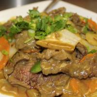 Beef Curry · Spicy. Sautéed sliced flank steak with bell peppers, onions, Vietnamese coconut curry sauce....