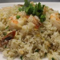 Shrimp Fried Rice · Stir-fried vegetables, shrimp and eggs on fried rice.