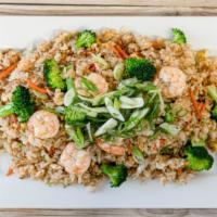 Fried Rice · Meal-sized portion of stir fried rice with eggs, vegetables and your choice of pork or chick...