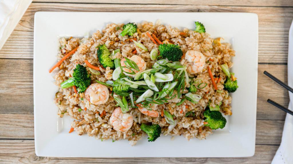 Fried Rice · Meal-sized portion of stir fried rice with eggs, vegetables and your choice of pork or chicken.
