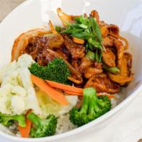 Korean Spicy Pork · Two different cuts of pork sauteed with onions in a spicy and savory gojuchang sauce.