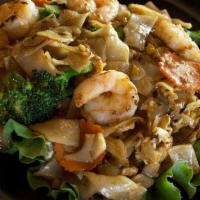 Pad See You · Flat noodles with egg, broccoli, and carrots in a sweet soy sauce.