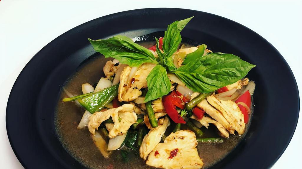 Thai Basil · Basil leaves, onions, bell peppers, and string beans in a chili garlic sauce.