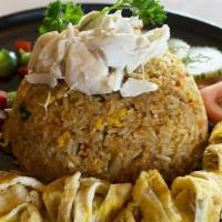 Crab Fried Rice · Fried rice, tomato, onion, carrot topped with egg and jumbo lump crab meat.