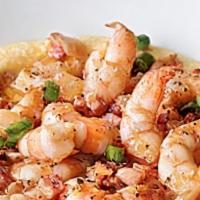 Shrimp & Grits · Our Famous sautéed shrimp in a flavorful creole sauce, red onions and peppers. Served overto...