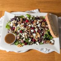 Dylan · Spring mix, goat cheese, kalamata olives, walnuts and cranberries served with balsamic vinai...