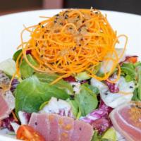Tuna Sashimi Salad · Seared yellowfin tuna, mix leaves salad, onion dressing, shredded daikon and carrot.