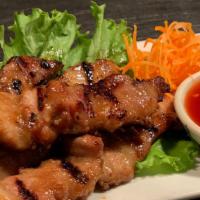 Moo Yang Kati Sod · Grilled marinated pork belly and spicy lime sauce