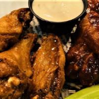 Buffalo Wings (10 Pieces) · Served with celery and your choice of blue cheese or ranch dressing.