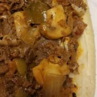Tony G'S Special · With mushrooms, sweet peppers, fried onions, provolone cheese and sauce.