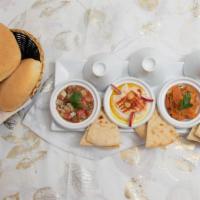 Moroccan Mezze · Zealous, hummus, spicy carrot, & tabbouleh.