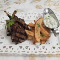 Lamb Chops · Hala certified. Served with sautéed vegetables, mixed salad, tzatziki, & fries.