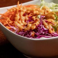 Ginger Miso Salad · Lettuce, cabbage, carrots, with ginger miso dressing.