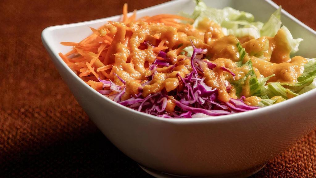 Ginger Miso Salad · Lettuce, cabbage, carrots, with ginger miso dressing.