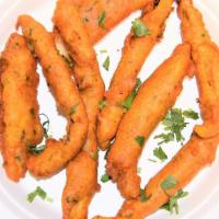 Fish Pakora Tilapia (6) · Juicy fish fillets are coated in a spicy batter and fried till a golden perfection. These ma...
