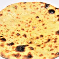 Aloo Paratha · Vegetarian. Whole wheat bread stuffed with mashed potatoes and mild spices.