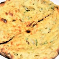 Onion Kulcha · Vegetarian. White flour bread stuffed with chopped onion and mild spices.