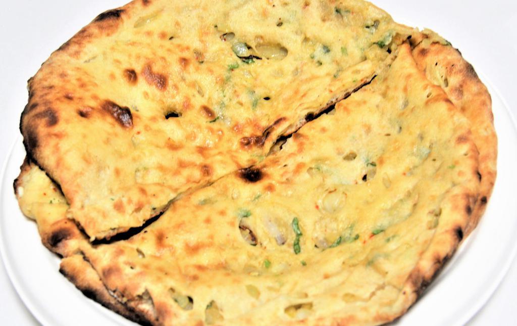 Onion Kulcha · Vegetarian. White flour bread stuffed with chopped onion and mild spices.