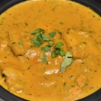 Lamb Korma & Rice · Cubes of lamb cooked with a creamy mild sauce made from a mixture of spices, almonds, nutmeg...