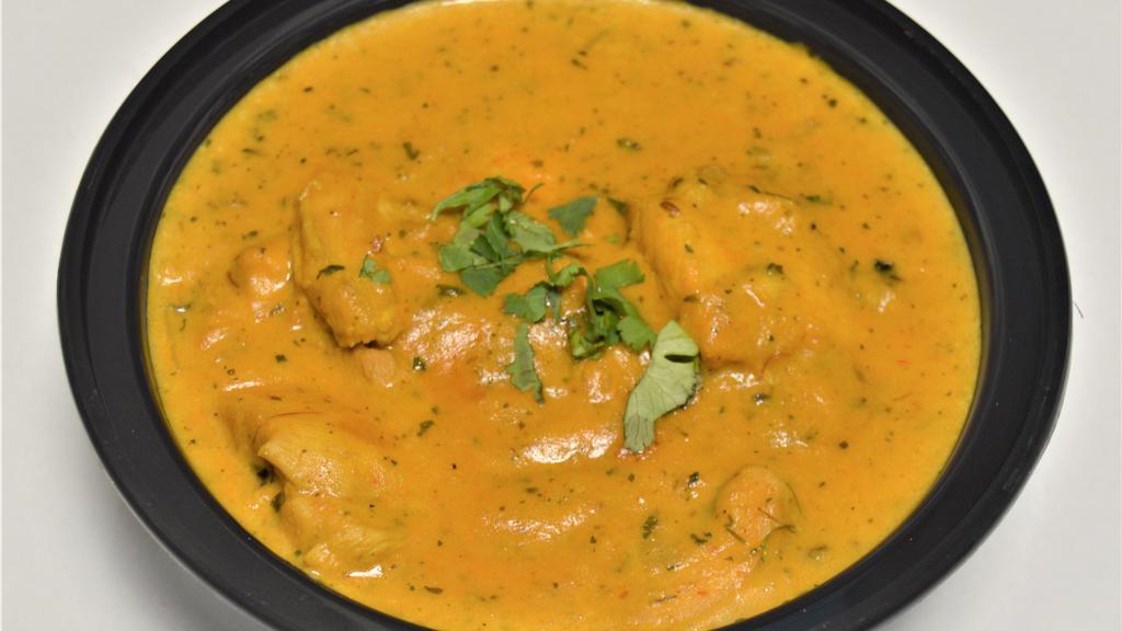 Lamb Korma & Rice · Cubes of lamb cooked with a creamy mild sauce made from a mixture of spices, almonds, nutmeg and cashews.