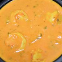 Shrimp Curry & Rice · Shrimp cooked with fresh tomato, ginger, garlic and onions. Prepared in an authentic sauce w...