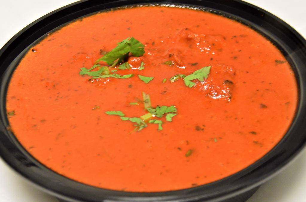 Butter Chicken & Rice · Chicken cooked in an exquisite creamy mild tomato sauce.