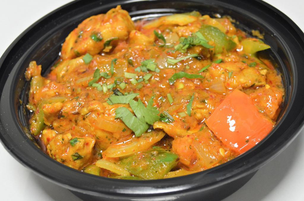 Chicken Karahi & Rice · Spicy. Chicken cooked with green peppers, onions, tomatoes, gingers, garlic and coriander.