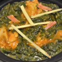 Chicken Saag & Rice · Chicken cooked until tender with spinach and green herbs and spices.