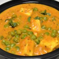 Mutter Paneer & Rice · Vegetarian. Homemade cheese cooked with green peas, onion, tomatoes, ginger-garlic paste, cu...