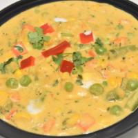 Navratan Korma & Rice · Vegetarian. A rich combination of veggies cooked with mild spices, onion, tomato, garlic, cr...