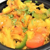 Aloo Gobi Masala & Rice · Vegetarian. Cauliflower and potatoes cooked in delicate spices with onion, tomatoes, ginger,...