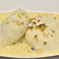 Ras Malai · Patties made with fresh cheese served cold in a sweetened milk sauce.