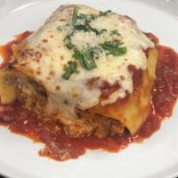 Lasagna Bolognese Pasta · Classic Italian lasagna layered with meat sauce and cheese.