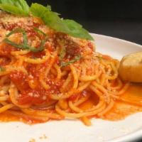 Spaghetti Pomodoro Pasta · Fresh spaghetti with marinara sauce and Parmesan cheese.