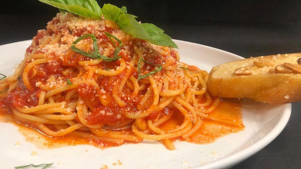 Spaghetti Pomodoro Pasta · Fresh spaghetti with marinara sauce and Parmesan cheese.
