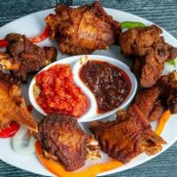 Fried Wings · Fried Turkey wings chopped and topped with finely shredded onion and pepper with a side of h...