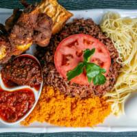 Waakye · Rice Cooked with Black Eye Beans With beef stew (delicious tomato sauce with added spices )w...