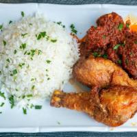 White Rice & Tomato Stew · Steamed white rice served tomato stew and choice of protein (Fried croaker Fish , Fried Chic...