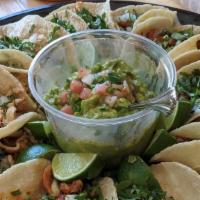 Taco Tray · 15 tacos your choice, Pastor (pork), Chicken, Carnitas, Asada, Vegetables, includes one pint...